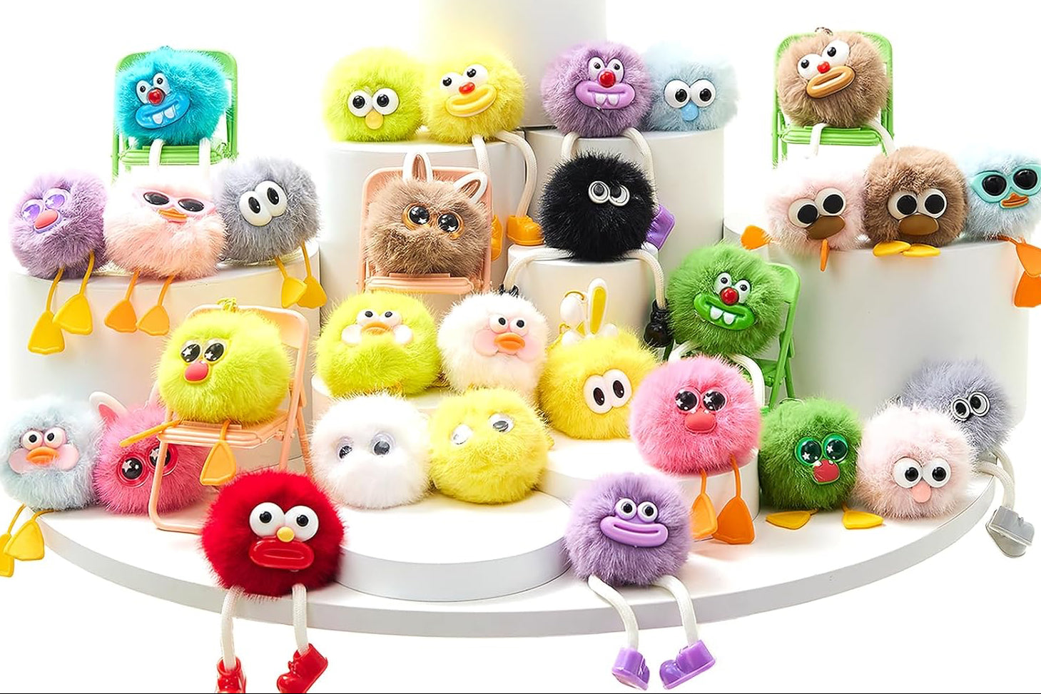 A collection of colorful fuzzy monster plush keychains displayed on white risers, with a hand holding three of the plushies in a circular inset and a set of 30 keychains advertised in the top right.